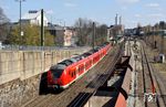 1440 825 ist mit einem weiteren 1440 als S 8 nach Mönchengladbach wegen Bauarbeiten abweichend im Ferngleis in Wuppertal-Barmen unterwegs. (29.03.2019) <i>Foto: Wolfgang Bügel</i>