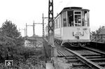 Ein Triebwagen der Bahnen des Rhein-Wupper-Kreises mit Bw 56 (Herbrand, Baujahr 1911) auf dem Überführungsbauwerk über die Bahnstrecke Opladen - Hilden in Immigrath. Eigentümer war der usprünglich der damalige Kreis Solingen. Im Jahr 1930 folgte eine Umbenennung des Betriebs in Straßenbahn Opladen - Ohligs. Die Bahn hatte zu diesem Zeitpunkt Kontakt mit zahlreichen Nachbarbetrieben. So traf man in Opladen auf die Mülheimer Kleinbahn AG, später Kölner Straßenbahnen, in Ohligs auf die Solinger Kreisbahn und die Bergische Kleinbahn AG, später Rheinische Bahngesellschaft AG, in Höhscheid an die Solinger Stadtbahn und in Langenfeld an die heutigen Bahnen der Stadt Monheim GmbH. Der Kreis Solingen war ab 1. August 1929 im Kreis Solingen-Lennep, 1931 umbenannt in Rhein-Wupper-Kreis, aufgegangen. Doch setzte sich der Begriff "Bahnen des Rhein-Wupper-Kreises" erst nach dem Zweiten Weltkrieg durch. Da der Kreis zu diesem Zeitpunkt schon einen flächendeckenden Busbetrieb unterhielt, war er bemüht, den Straßenbahnbetrieb so schnell wie möglich einzustellen. Am 31. Januar 1954 fuhr der letzte Zug auf der Strecke von Landwehr nach Höhscheid und am 30. Juni 1955 folgte die Stilllegung der Strecke von Opladen nach Ohligs. Am 4. Juli 1969 fusionierten die Bahnen des Rhein-Wupper-Kreises mit der Kraftverkehr Wupper-Sieg AG, der Sitz wurde von Langenfeld nach Leverkusen verlegt.  (1951) <i>Foto: Gerd Wolff</i>
