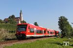 Vor der Kulisse des Klosters Birnau ist eine Dreier-Einheit 650 (vorne 650 018) als RB 22774 (Friedrichshafen Stadt - Radolfszell) bei Uhldingen-Mühlhofen unterwegs. (15.09.2019) <i>Foto: Joachim Bügel</i>
