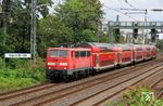 Auch die Tage der lokbespannten Züge der Linie RE 4 zwischen Dortmund und Aachen sind gezählt. Die "Schnapszahllok" 111 111-1 fährt mit RE 10420 nach Wuppertal Hbf ein. (17.08.2020) <i>Foto: Wolfgang Bügel</i>