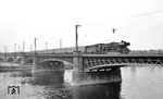 03 2214 mit P 3807 nach Görlitz auf der 1901 entstandenen Marienbrücke über die Elbe zwischen Dresden Mitte und Dresden-Neustadt. (04.1977) <i>Foto: Burkhard Wollny</i>