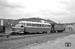 LT 4, ein Sattelschlepper-Schienenbus auf 90-PS-Borgward-Lkw-Chassis (Baujahr 1953), mit Wagen 132 (Herbrand, Baujahr 1908) als Personenzug nach Westerland im Bahnhof List/Sylt. (13.05.1961) <i>Foto: Helmut Röth</i>