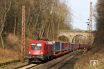 ÖBB 1116.128 mit dem Winner-Zug DGS 44995 auf der neuen Verbindung von Wuppertal-Langerfeld nach Sommacampagna Sona nahe Verona am Beginn seiner Reise bei Gruiten. (20.02.2021) <i>Foto: Joachim Bügel</i>