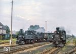 Im Bahnhof Mügeln begegnen sich 99 1608 und eine weitere IV K mit 99 1584. (28.08.1982) <i>Foto: Joachim Schmidt</i>