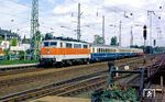 S-Bahnlok 111 113 vor dem Kurz-IC 646 "Hellweg" (Dortmund - Wuppertal - Köln) in Solingen-Ohligs (heute Solingen Hbf). (25.07.1988) <i>Foto: Joachim Bügel</i>