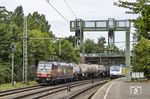 In Hamburg-Harburg begegnet HSL 185 600 der 246 006 am RE 5 nach Cuxhaven. (27.07.2021) <i>Foto: Thorsten Eichhorn</i>