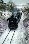 44 1342 (Bw Eisenach) rollt mit einem Güterzug bei Förtha zu Tal. Der Aufenthalt unmittelbar im DDR-Grenzgebiet bei Gerstungen erforderte damals schon viel Risikobereitschaft. (01.1968) <i>Foto: Bruno Gode</i>
