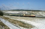 103 195 vor IC 599 "Hans Sachs" nach München bei Fahlenbach, südlich von Ingolstadt. (19.02.1988) <i>Foto: Wolfgang Bügel</i>