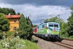 "Mit der Bahn in die Berge" lautet der Werbeslogan an 111 039, die hier mit RB 59519 nach Mittenwald bei Mühltal unterwegs ist. (19.06.2011) <i>Foto: Stefan von Lossow</i>