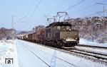 194 012 (Bw Augsburg) fährt mit einem Güterzug aus Mannheim durch Maulbronn West. (02.1984) <i>Foto: Heiko Hamm</i>