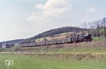 65 1054 (Bw Arnstadt) hat mit einem Personenzug nach Saalfeld soeben den Bahnhof Rottenbach verlassen. (23.04.1973) <i>Foto: Robin Fell</i>