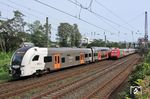 Nahe des Wuppertaler Hauptbahnhofs begegnen sich RRX 462 031 als RE 26146 nach Aachen und der IC 2049 nach Dortmund mit der schiebenden 101 066. (24.08.2023) <i>Foto: Wolfgang Bügel</i>