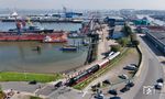 012 104 in Cuxhaven mit Blick auf die Hafenanlagen des Amerikahafen, Neuem und Altem Fischereihafen und der Mützelfeldtwerft am Schleusenpriel. (09.09.2023) <i>Foto: Joachim Schmidt</i>